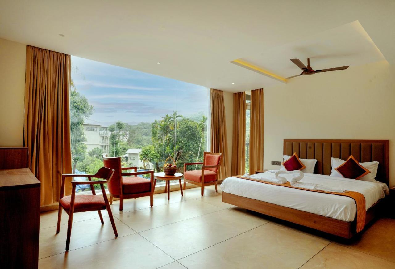 Bluemist Resorts Athirappilly Esterno foto