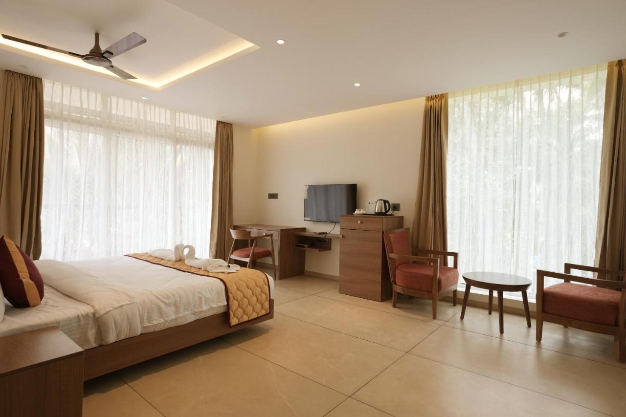 Bluemist Resorts Athirappilly Esterno foto